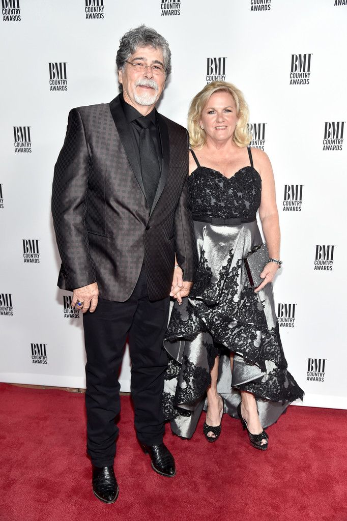 Randy Owen with wife on red carpet