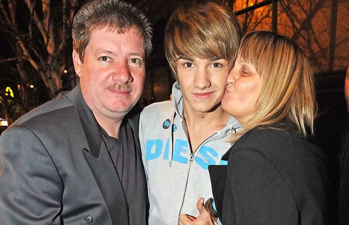 Liam Payne with his parents Geoff and Karen in the year 2010