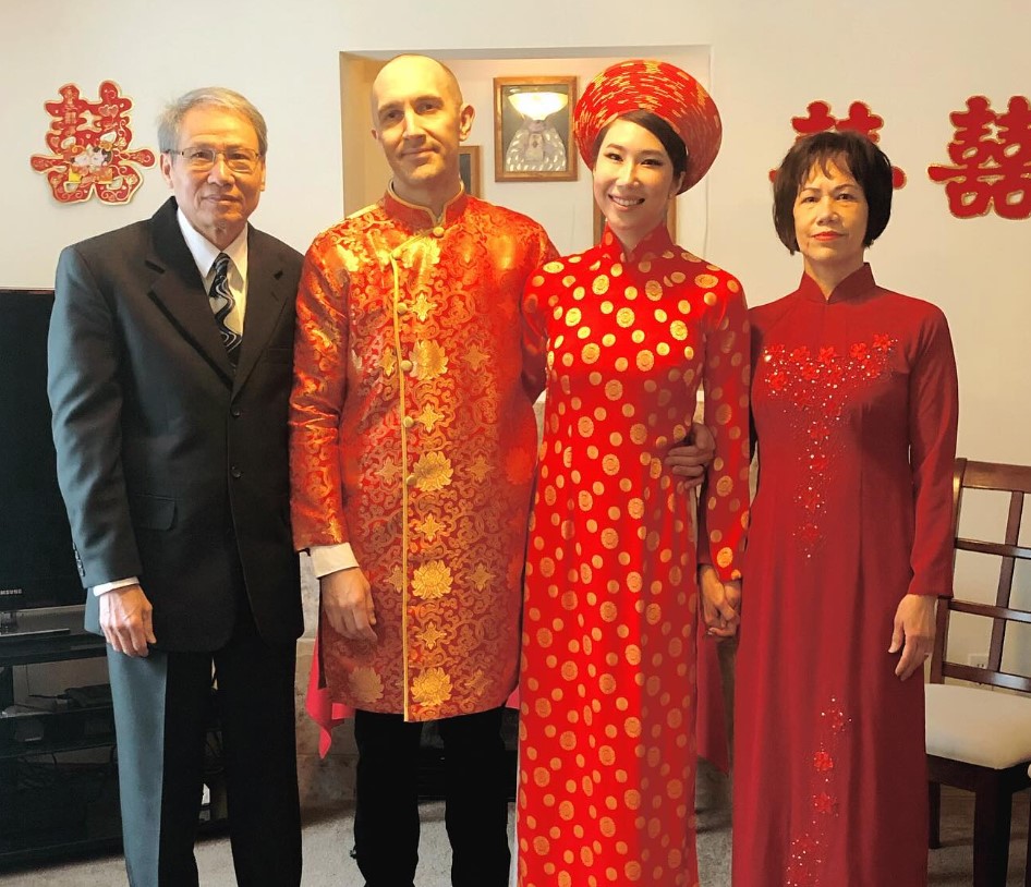 Linh with her husband, Finn McKenty, and her parents