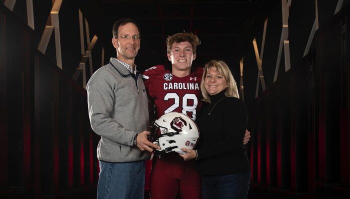 Mitch Jeter with his parents, Andrew and Stacy Mitch Jeter with his parents, Andrew and Stacy